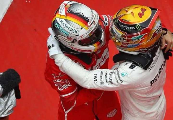 Los pilotos Vettel (izq.) y Hamilton. /Foto AP