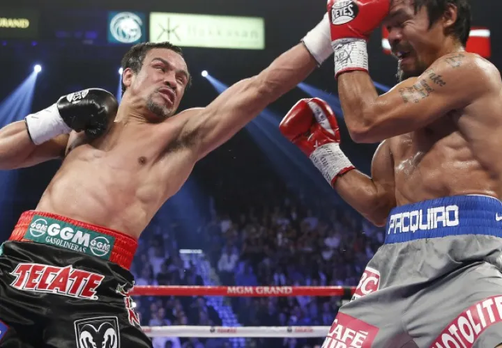 Juan Manuel Márquez dejó su récord en  56-7-1. 