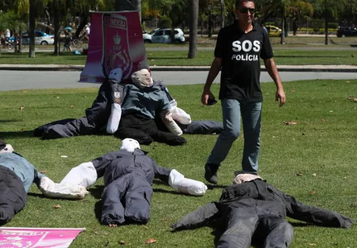 Exigen justicia para los policías /Foto EFE