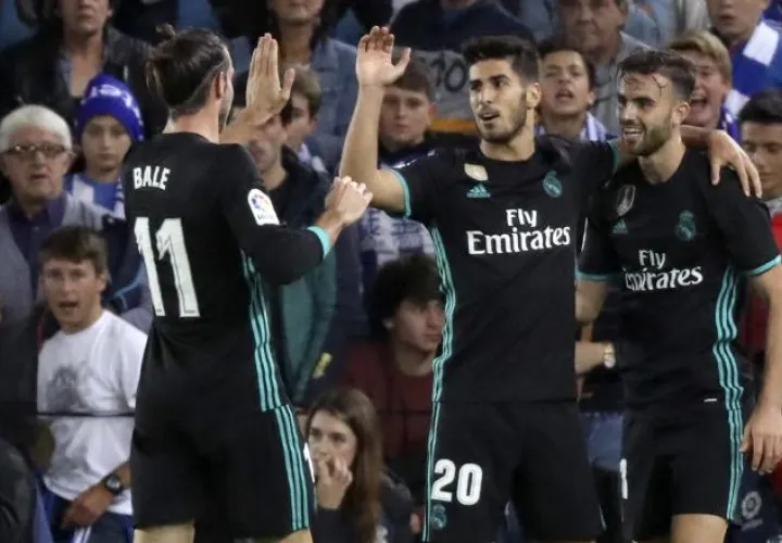 Marco Asensio (centro), Gareth Bale (izq.) y Borja Mayoral. /Foto AP