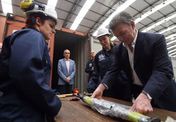 Juan Manuel Santos, durante el acto final de inutilización de las arma. EFE