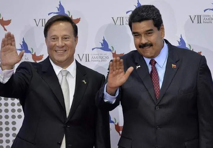 Juan Carlos Varela y Nicolás Maduro / Archivo.