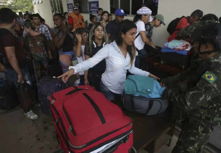 Venezolanos buscan un mejor futuro en Boa Vista, Brasil, pero pasan hambre y dificultades.