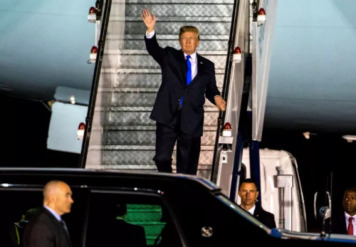 Trump fue más escueto cuando llegó a Singapur a última hora de la tarde.