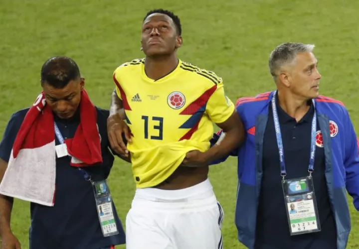 Yerry Mina, triste, luego de la eliminación de su equipo en la tanda de penales ante Inglaterra. Declaró que merecieron más en el juego. /Foto Archivo