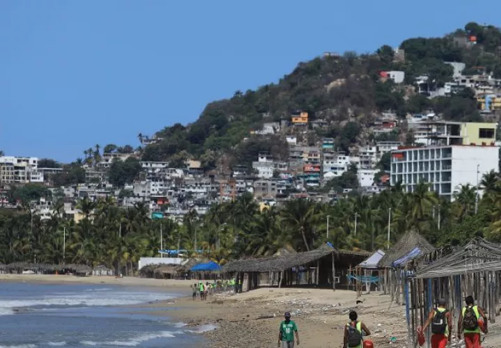 El año pasado llegaron a América 219.4 millones de turistas. EFE
