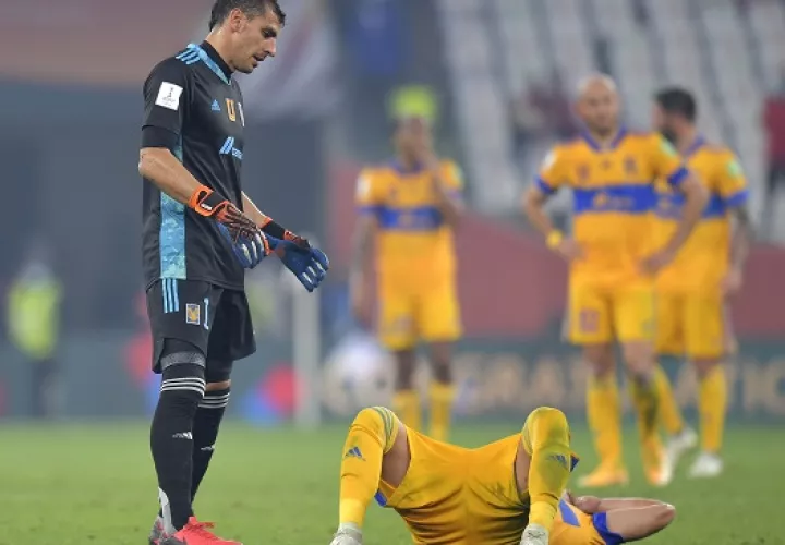 Jugadores del Tigres lamentan la derrota ante los alemanes. Foto: EFE