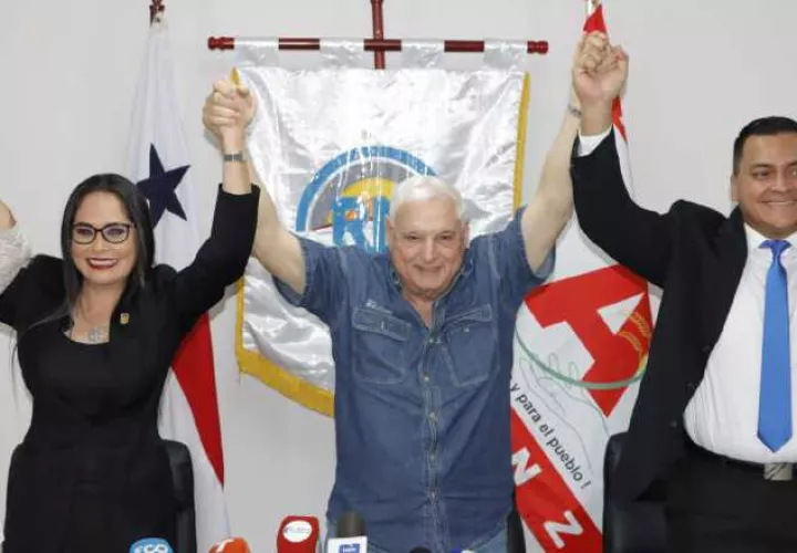 Zulay Rodríguez, Ricardo Martinelli y Rubén Darió Campos. Víctor Arosemena.