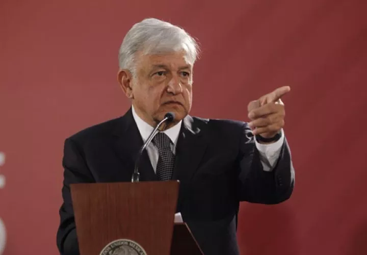 El presidente Andrés Manuel López Obrador, prometió combatir la violencia. FOTO/EFE