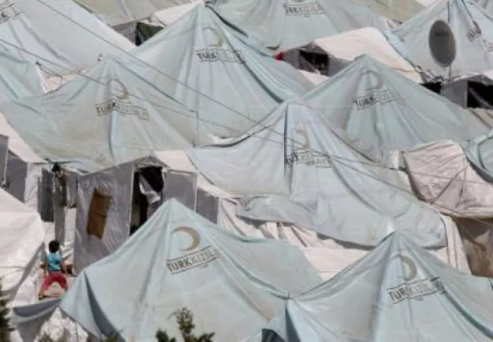 Niños sirios juegan en un campamento. Foto: EFE